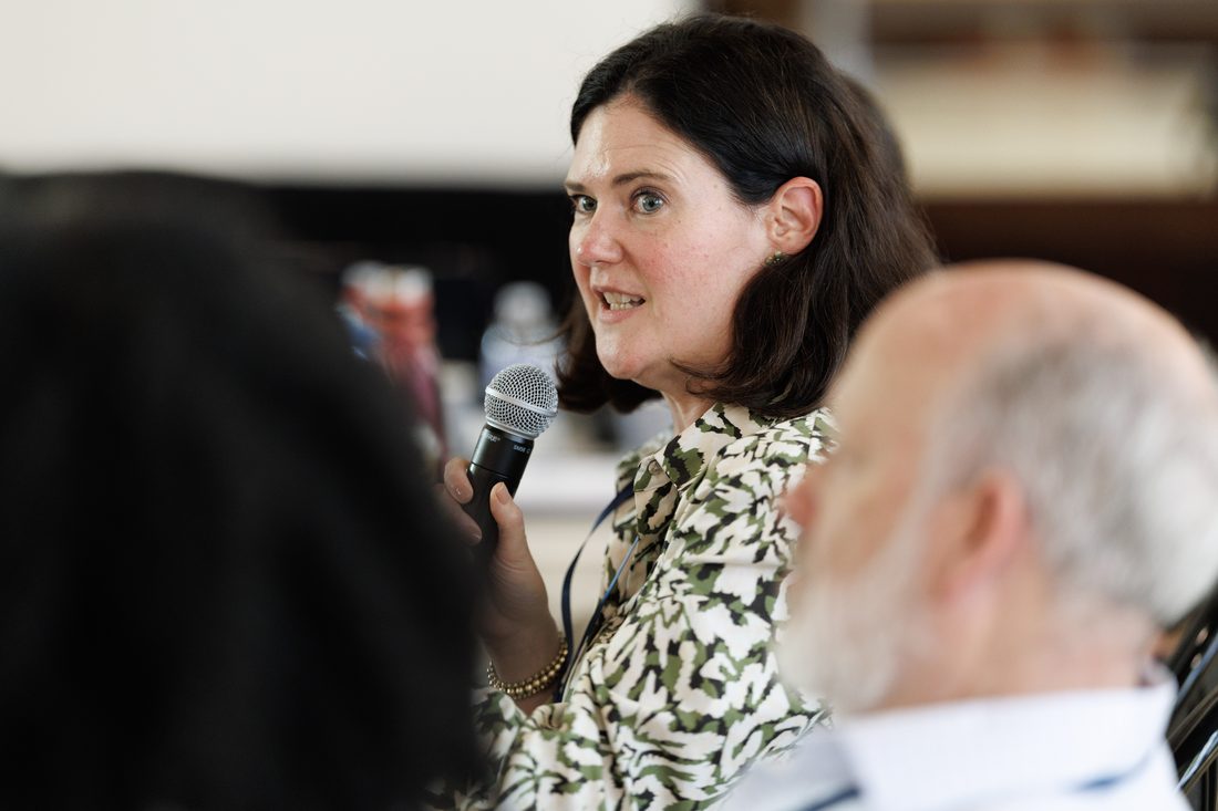 A participant asking a question during a session